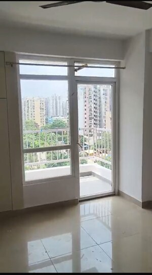 Room in 2.5 BHK Apartment at Charms Castle, Raj Nagar Extension – for Rent