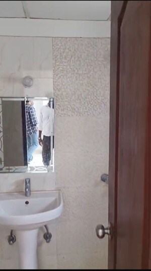 Bathroom in 2.5 BHK Apartment at Charms Castle, Raj Nagar Extension – for Rent