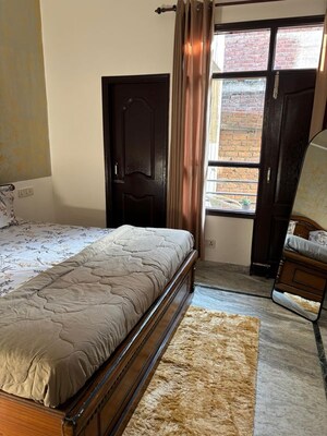 Bedroom in 3 BHK Apartment at Swastik Homes, Dhakoli – for Rent