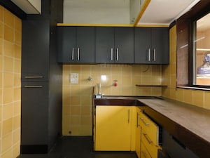 Kitchen in 2 BHK Apartment at Devidayal Apartments, Mulund West – for Sale
