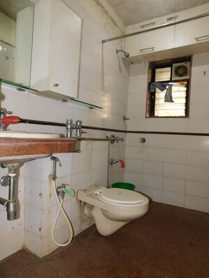 Bathroom in 2 BHK Apartment at Devidayal Apartments, Mulund West – for Sale