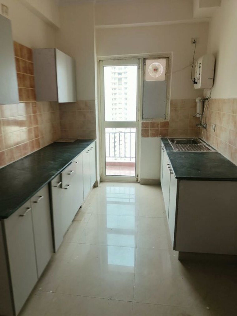 Kitchen, aims-golf-city 2 Bedroom 950 Sq.Ft. Apartment In Sector 75 Noida 10782262