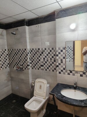 Bathroom in 3 BHK Apartment at Saya Gold Avenue, Vaibhav Khand – for Rent