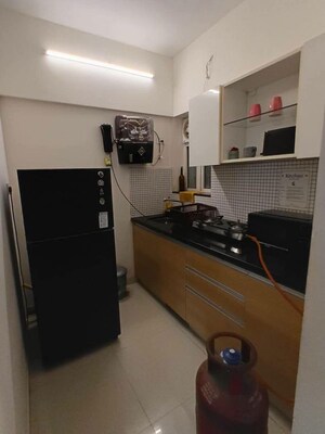 Kitchen in 1 BHK Apartment at Lodha Versova, Versova – for Rent