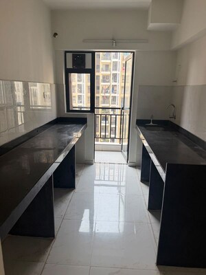 Kitchen in 2 BHK Apartment at Runwal Gardens Phase I, Dombivli East – for Rent