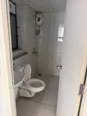Bathroom in 2 BHK Apartment at Runwal Gardens Phase I, Dombivli East – for Rent