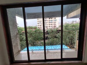 Balcony in 2 BHK Apartment at Pranjee Garden City, Katrap – for Sale