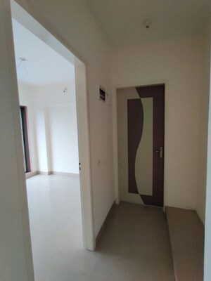 Bedroom in 2 BHK Apartment at Pranjee Garden City, Katrap – for Sale