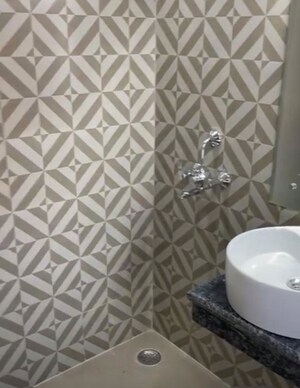 Bathroom in 2.5 BHK Apartment at SCC Blossom, Raj Nagar Extension – for Sale