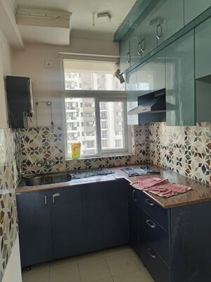 Kitchen in 2.5 BHK Apartment at Amrapali Leisure Park, Amrapali Leisure Valley – for Rent