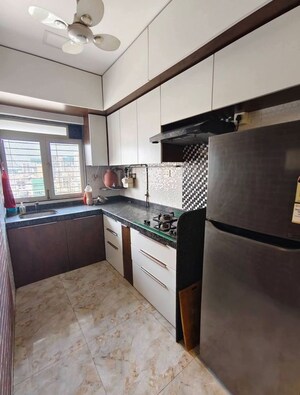 Kitchen in 1 BHK Apartment at Sai Siddhant D N Nagar Krishna CHS LTD, Andheri West – for Rent