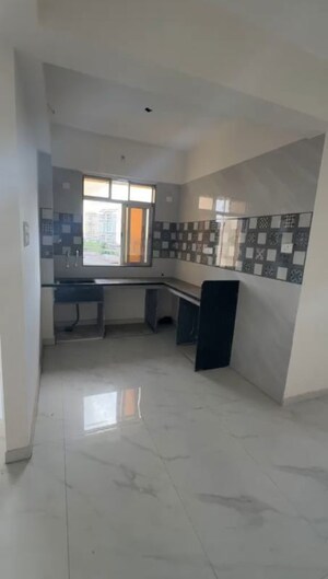 Kitchen in 1 BHK Apartment at Saigan Nav Samidha CHS, Dombivli East – for Sale