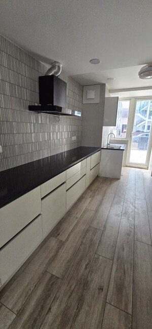 Kitchen in 4 BHK Apartment at TREVOC Royal Residences, Sector 56 – for Sale