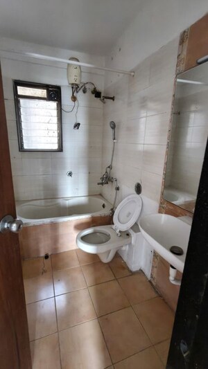 Bathroom in 2 BHK Apartment at Serenity Complex, Andheri West – for Sale