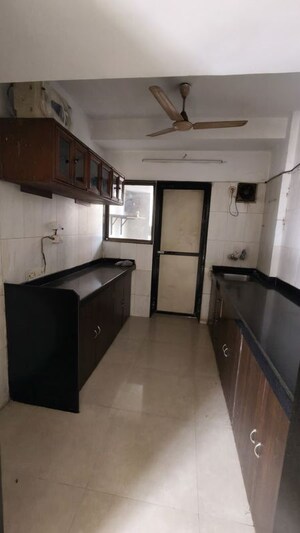 Kitchen in 2 BHK Apartment at Serenity Complex, Andheri West – for Sale