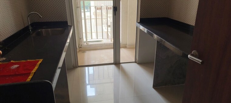 Kitchen, lodha-amara 2 Bedroom 672 Sq.Ft. Apartment In Kolshet Road Thane 10782670
