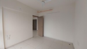Room in 2 BHK Apartment at Godrej Nirvaan, Themghar – for Rent