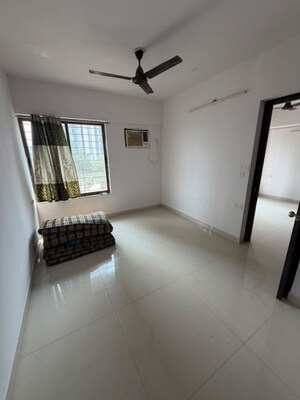 Living Room in 1 BHK Apartment at Lodha Crown Quality Homes, Majiwada – for Rent
