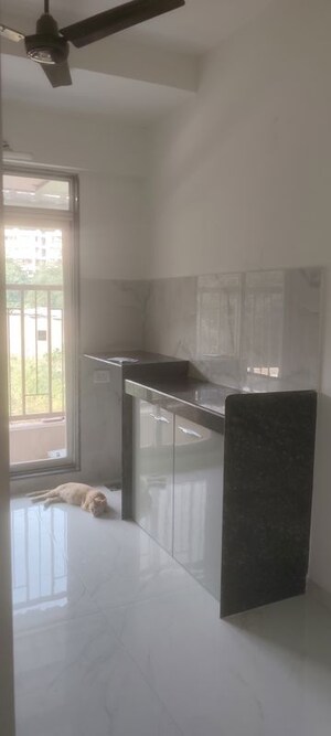 Kitchen in 1 BHK Apartment at Metropolis Bayside, Kasarvadavali – for Rent