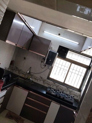 Kitchen in 2 BHK Apartment at Ideal Pristine Tower, Kasarvadavali – for Rent
