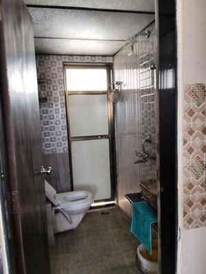 Bathroom in 2 BHK Apartment at Ideal Pristine Tower, Kasarvadavali – for Rent