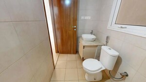 Bathroom in 2 BHK Apartment at Bhartiya Nikoo Homes, Thanisandra Main Road – for Sale