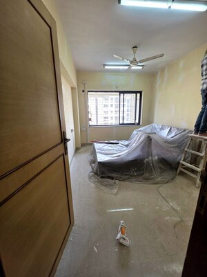 Living Room in 2 BHK Apartment at K Raheja Palm Court, Malad West – for Rent