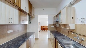 Kitchen in 2 BHK Apartment at Prestige Tranquility, Budigere – for Sale