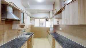 Kitchen in 2 BHK Apartment at Prestige Tranquility, Budigere – for Sale