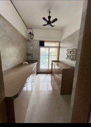 Kitchen in 2 BHK Apartment at Dosti West County Phase 2 Dosti Cedar, Balkum Pada – for Rent