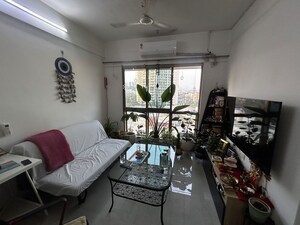 Living Room in 1 BHK Apartment at Sheth Vasant Oasis, Andheri East – for Rent