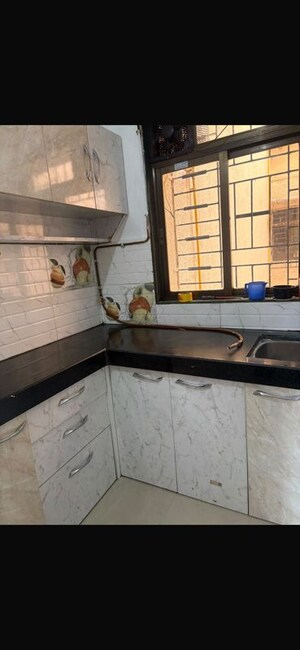 Kitchen in 1 BHK Apartment at Squarefeet Grand Square, Anand Nagar – for Rent