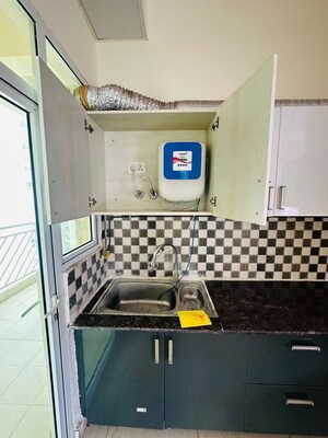 Kitchen in 3 BHK Apartment at Gaur Saundaryam, Tech Zone 4 Greater Noida – for Rent