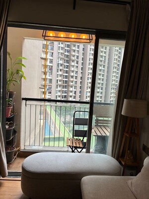 Living Room in 2 BHK Apartment at Runwal Eirene, Balkum Pada – for Sale