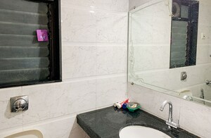Bathroom in  Pg at DB Orchid Suburbia, Kandivali West – for Rent