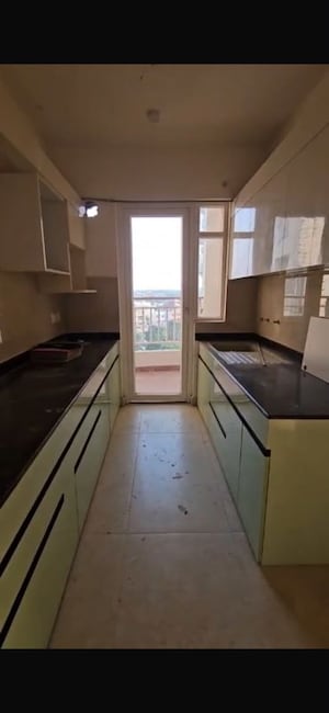 Kitchen in 2 BHK Apartment at Rishita Mulberry Heights, Sushant Golf City – for Rent