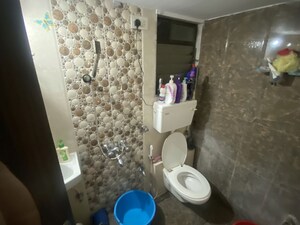 Bathroom in 1 BHK Apartment at Agarwal Estate, Thane West – for Sale