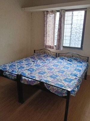 Bedroom in 2 BHK Apartment at Aundh – for Rent