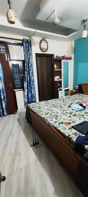 Bedroom in 2 BHK Builder Floor at Mahavir Enclave – for Sale