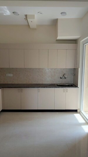 Kitchen in 2 BHK Apartment at Amrapali Riverview, Amrapali Leisure Valley – for Rent