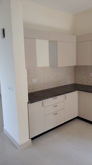 Kitchen in 2 BHK Apartment at Amrapali Riverview, Amrapali Leisure Valley – for Rent