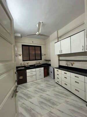Kitchen in 2 BHK Apartment at Mahim Landmark, Mahim – for Rent