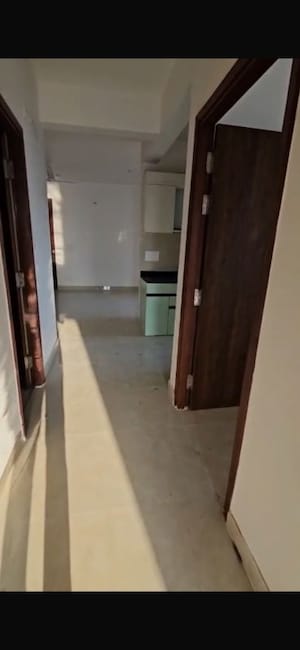Building Lobby in 2 BHK Apartment at Rishita Mulberry Heights, Sushant Golf City – for Rent