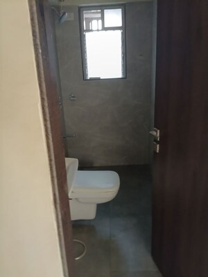 Bathroom in 2 BHK Apartment at Royal Eksar Apartment, Borivali West – for Sale