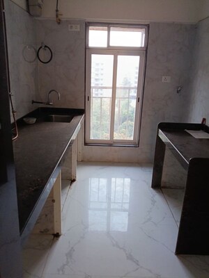 Kitchen in 2 BHK Apartment at Royal Eksar Apartment, Borivali West – for Sale