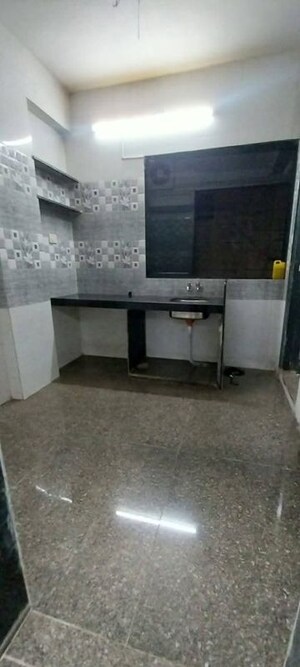 Kitchen in 1 RK Apartment at Ghansoli Sector 4 – for Rent