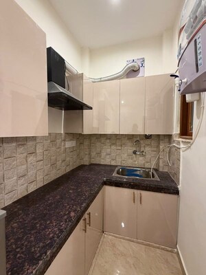 Kitchen in Studio Builder Floor at Sushant Lok I – for Rent