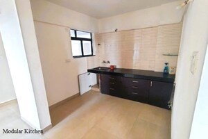 Kitchen in 2 BHK Apartment at Gurukrupa Astter, Wadgaon Sheri – for Rent