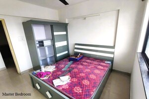Master Bedroom in 2 BHK Apartment at Gurukrupa Astter, Wadgaon Sheri – for Rent