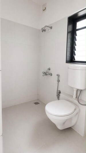 Bathroom in 3 BHK Apartment at Puranik City, Kasarvadavali – for Sale